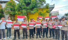 Semarak HUT RI Ke-80, Polsek Ibu Bagikan Bendera Merah Putih Dan Ajak Tertib Berlalu Lintas